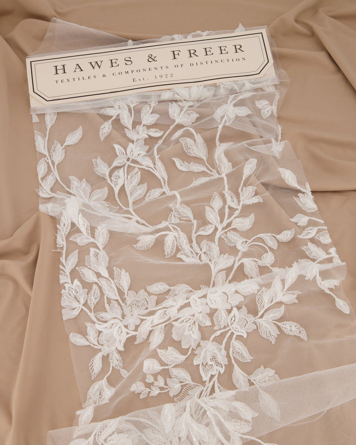 BRIDGETTE EMBROIDERED FLORAL TULLE IN IVORY.